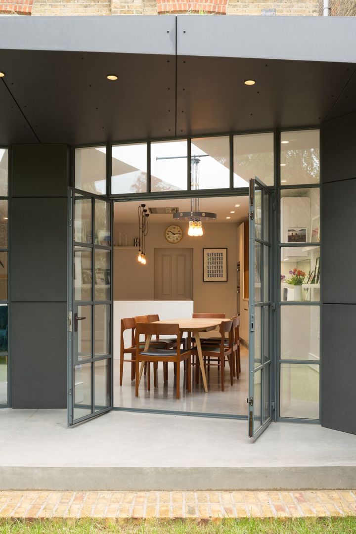 Patio Fraher and Findlay Taman Modern crittall doors,patio,dining room,open living,pendant lighting,glass walls,polished concrete,kitchen,grey,living room,minimalist