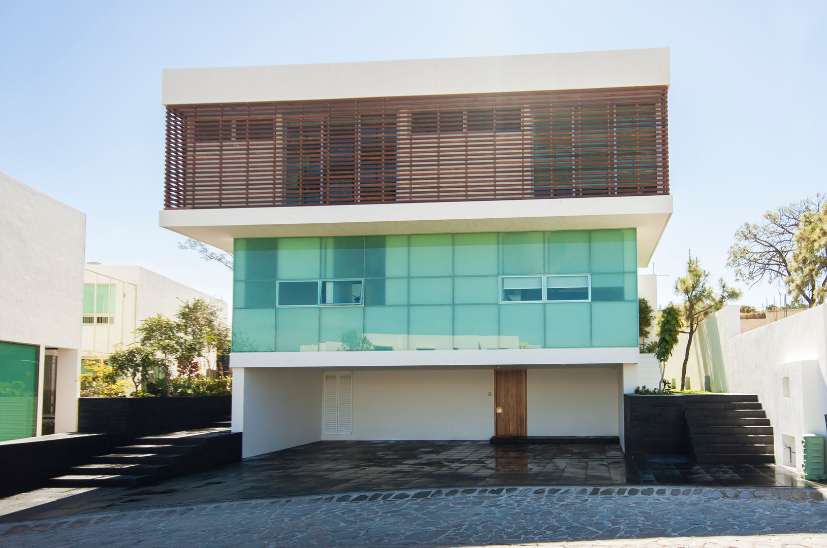 Casa Minimalista en Zapopan, TaAG Arquitectura TaAG Arquitectura บ้านและที่อยู่อาศัย