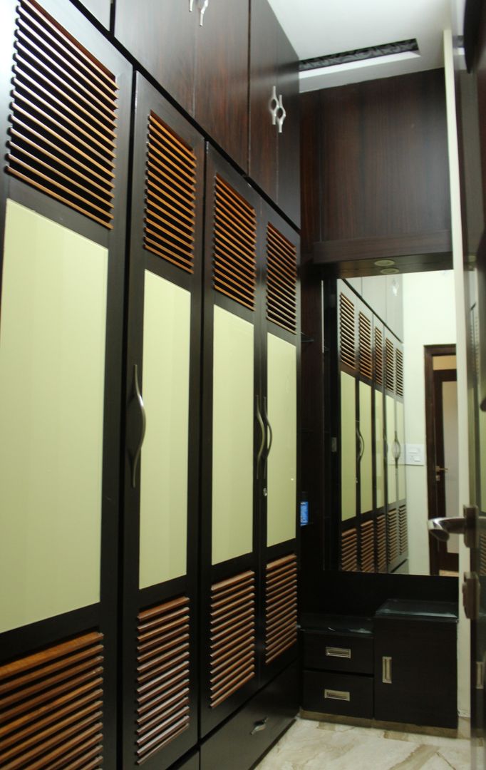 Wardrobes in younger son's bedroom SA Architects Modern style bedroom Wood Wood effect Wardrobes & closets