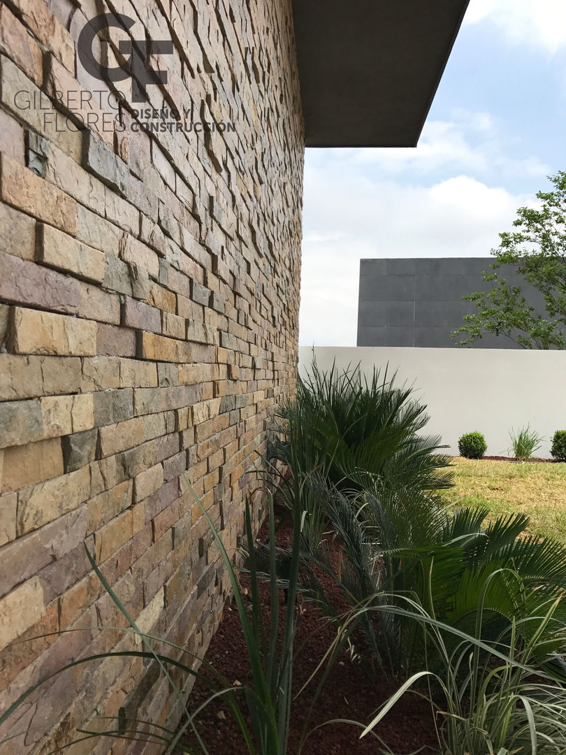 Detalle Muro Jardin GF ARQUITECTOS Paredes y pisos de estilo moderno Piedra