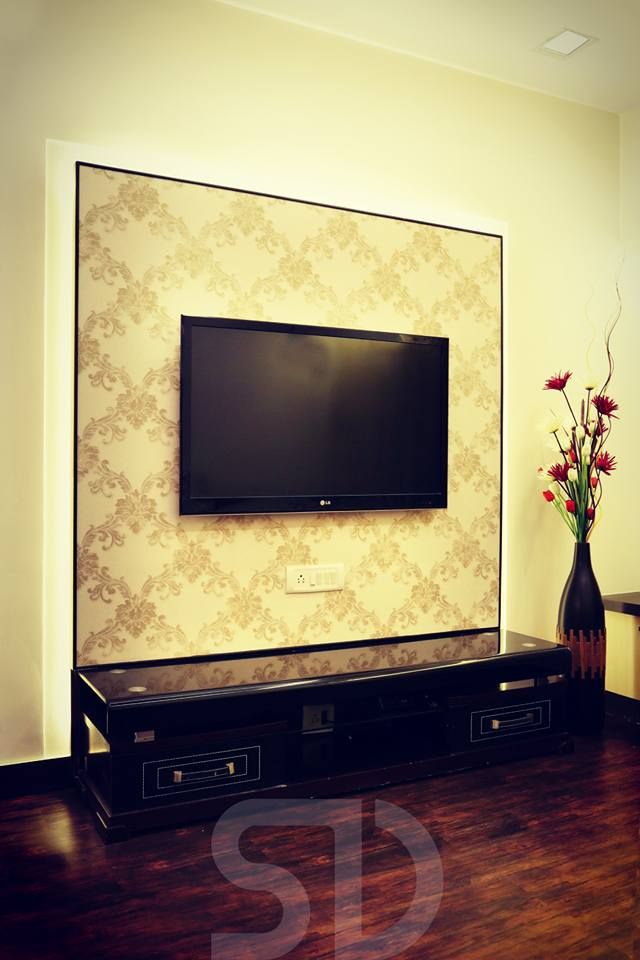 T.V. Paneling with Unit SUMEDHRUVI DESIGN STUDIO Living room