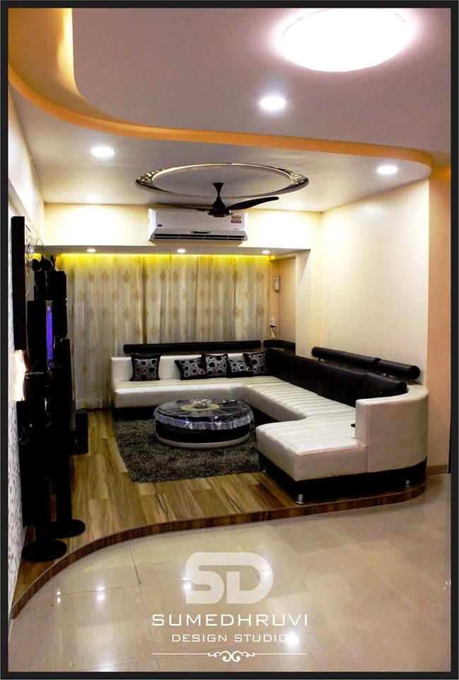 Mr. Dhanjal's Residence, SUMEDHRUVI DESIGN STUDIO SUMEDHRUVI DESIGN STUDIO Salas de estar modernas