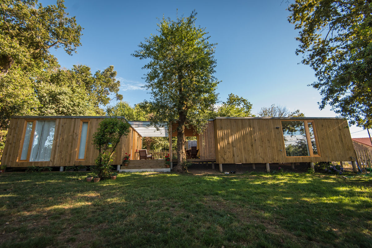 CASA MODULAR DE MADERA HÉCTOR & PURI, ADDOMO ADDOMO Giardino in stile scandinavo