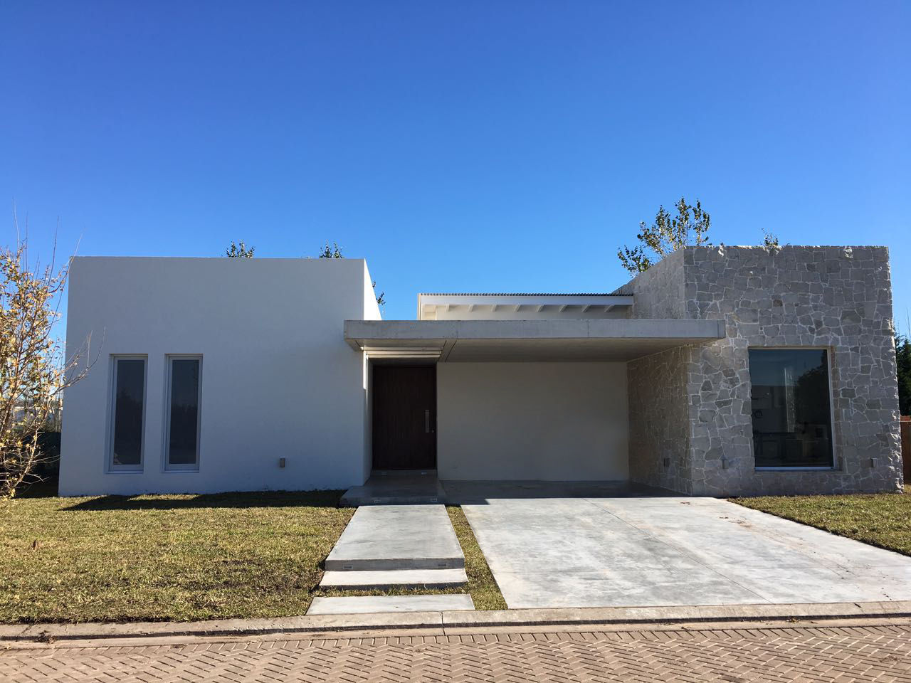 Casa Traverso, Estudio Victoria Suriguez Estudio Victoria Suriguez Moderne huizen