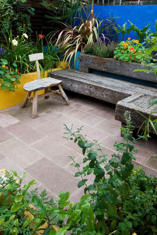 L shaped railway sleeper bench Earth Designs Mediterranean style garden Furniture
