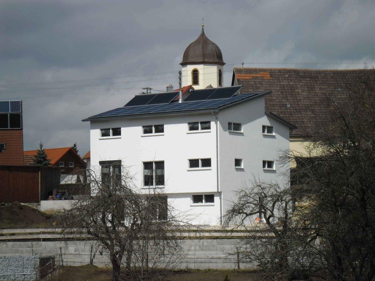 Neubau eines EFH als Sonnenhaus | JMM, a r c h i t e k t u r b ü r o grimm a r c h i t e k t u r b ü r o grimm Modern houses