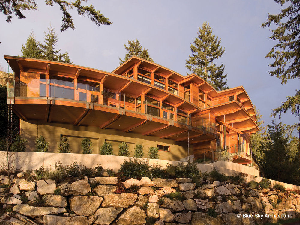 Exterior View Helliwell + Smith • Blue Sky Architecture Modern houses Sky,Plant,Plant community,Building,Window,Tree,Wood,Cottage,Real estate,Facade