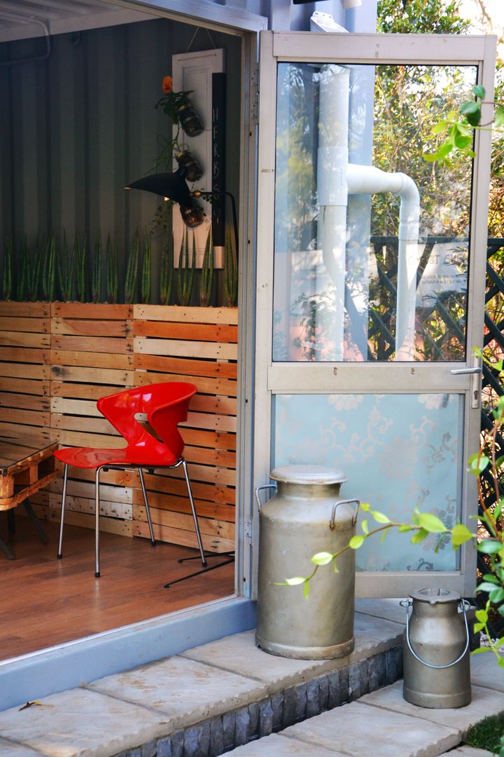 entrance to container home Acton Gardens Industrial style houses Metal