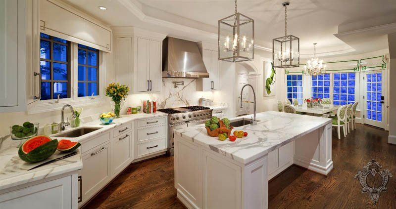 Kitchen Kellie Burke Interiors Kitchen island,pendants,white counters,stainless steel