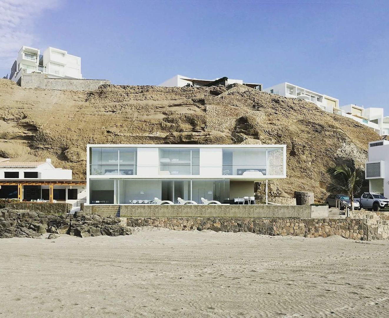 Casa en playa Misterio, ARCHITECTS ARCHITECTS บ้านและที่อยู่อาศัย คอนกรีต