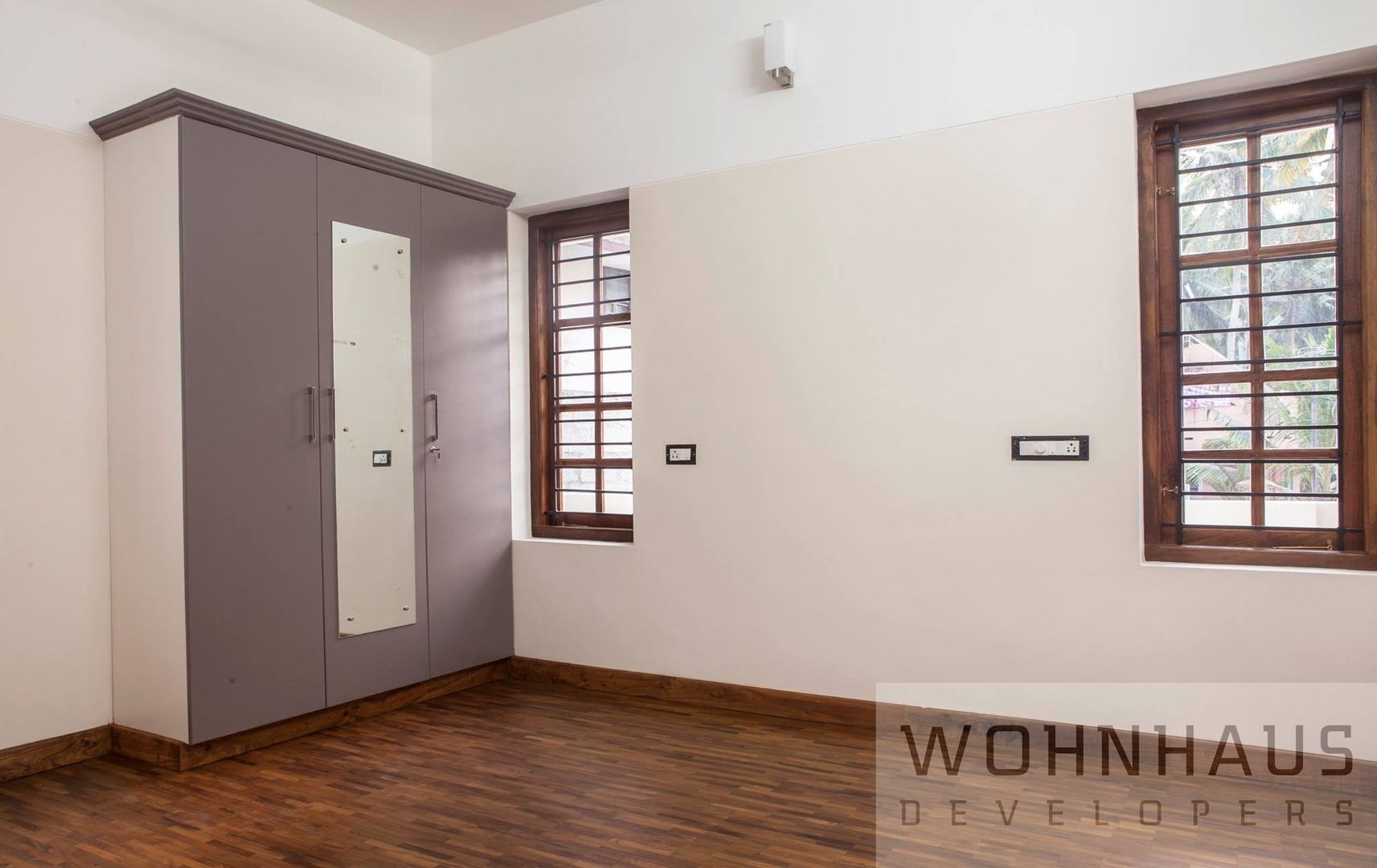 1400sqft House in Trivandrum, Wohnhaus Developers Wohnhaus Developers Moderne Schlafzimmer Holz Holznachbildung