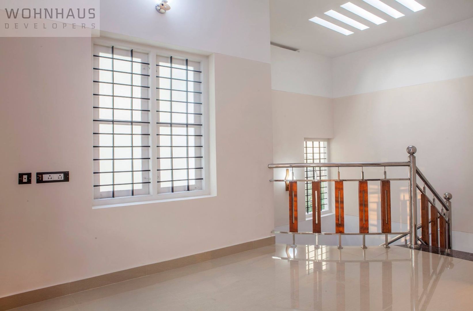 1400sqft House in Trivandrum, Wohnhaus Developers Wohnhaus Developers Modern Corridor, Hallway and Staircase Ceramic