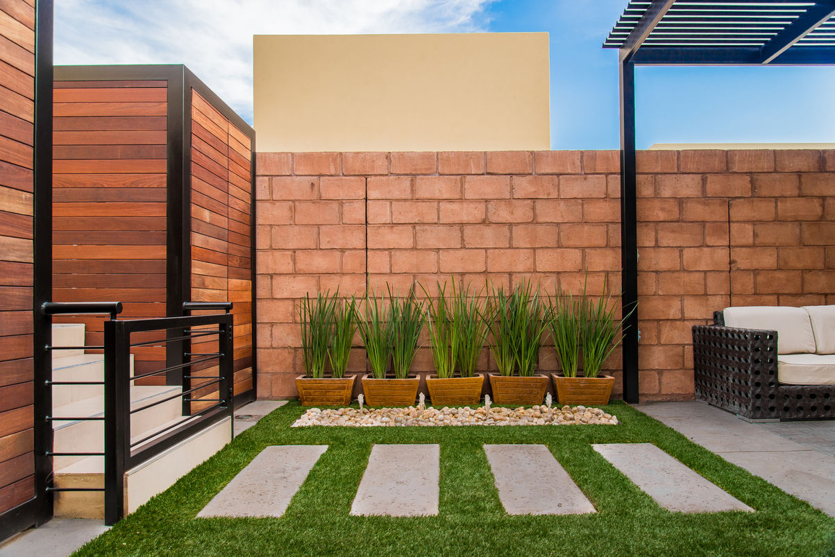 ​Área Exterior SFM S2 Arquitectos Jardines de estilo moderno