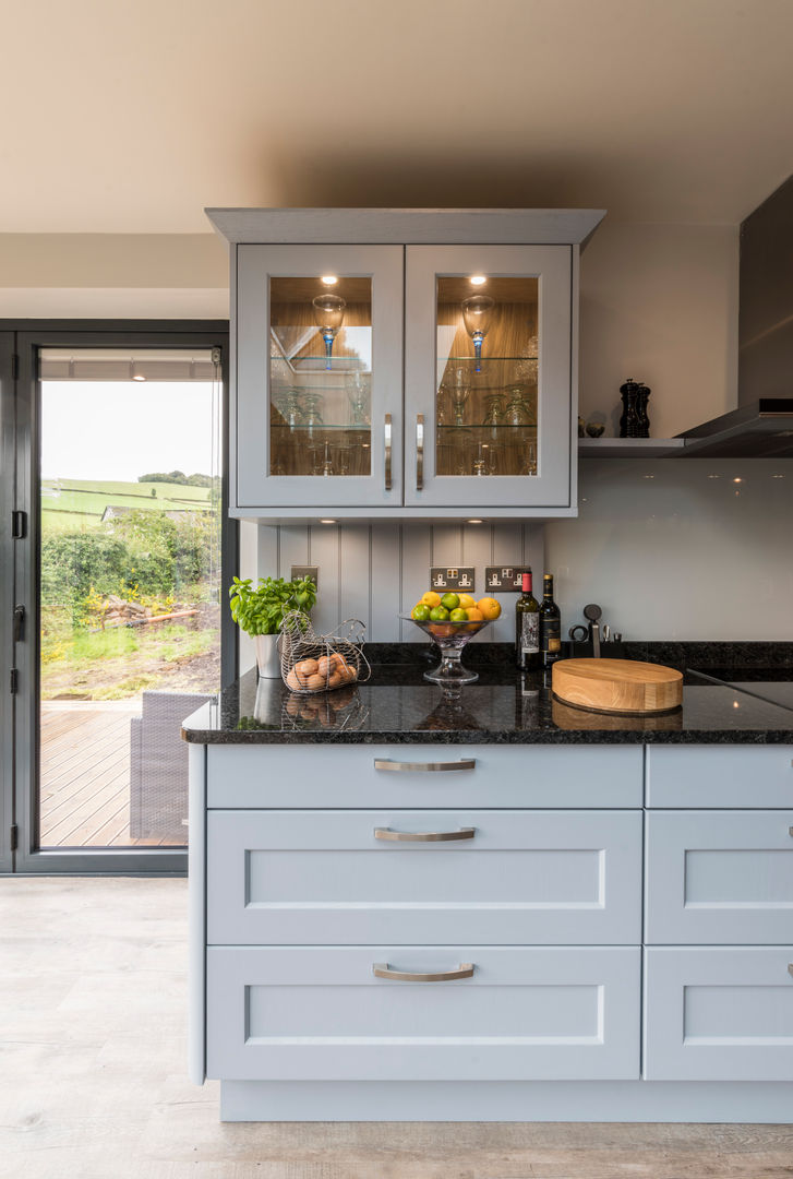 High Peak. Stunning views of the High Peak countryside from this family room extension, John Gauld Photography John Gauld Photography Modern Mutfak Shaker,Wall cabinet