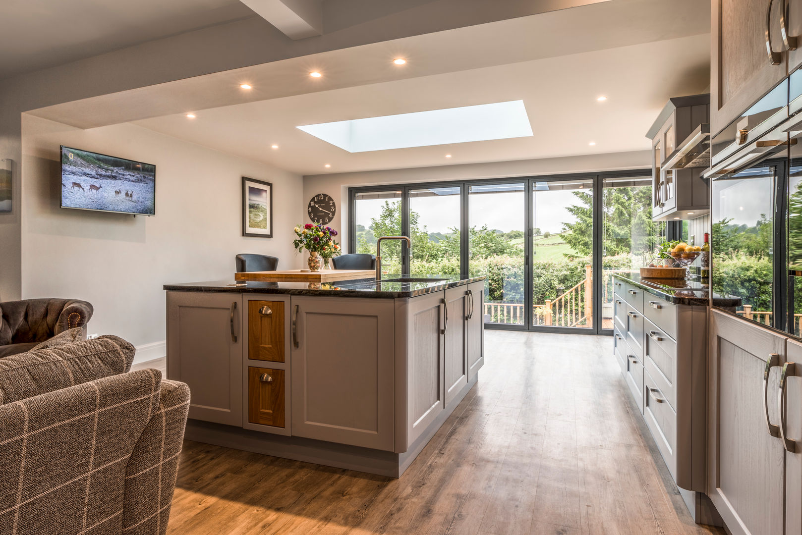 High Peak. Stunning views of the High Peak countryside from this family room extension, John Gauld Photography John Gauld Photography Modern kitchen