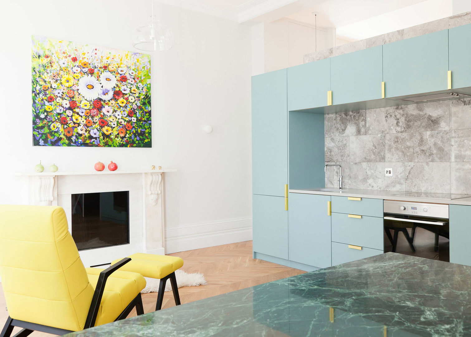 Westbourne Gardens NAKED Kitchens Modern kitchen yellow chair,blue cabinets,gold handles,miele,oven,floral artwork,fireplace,modern,open plan,contemporary,mottled grey tiles