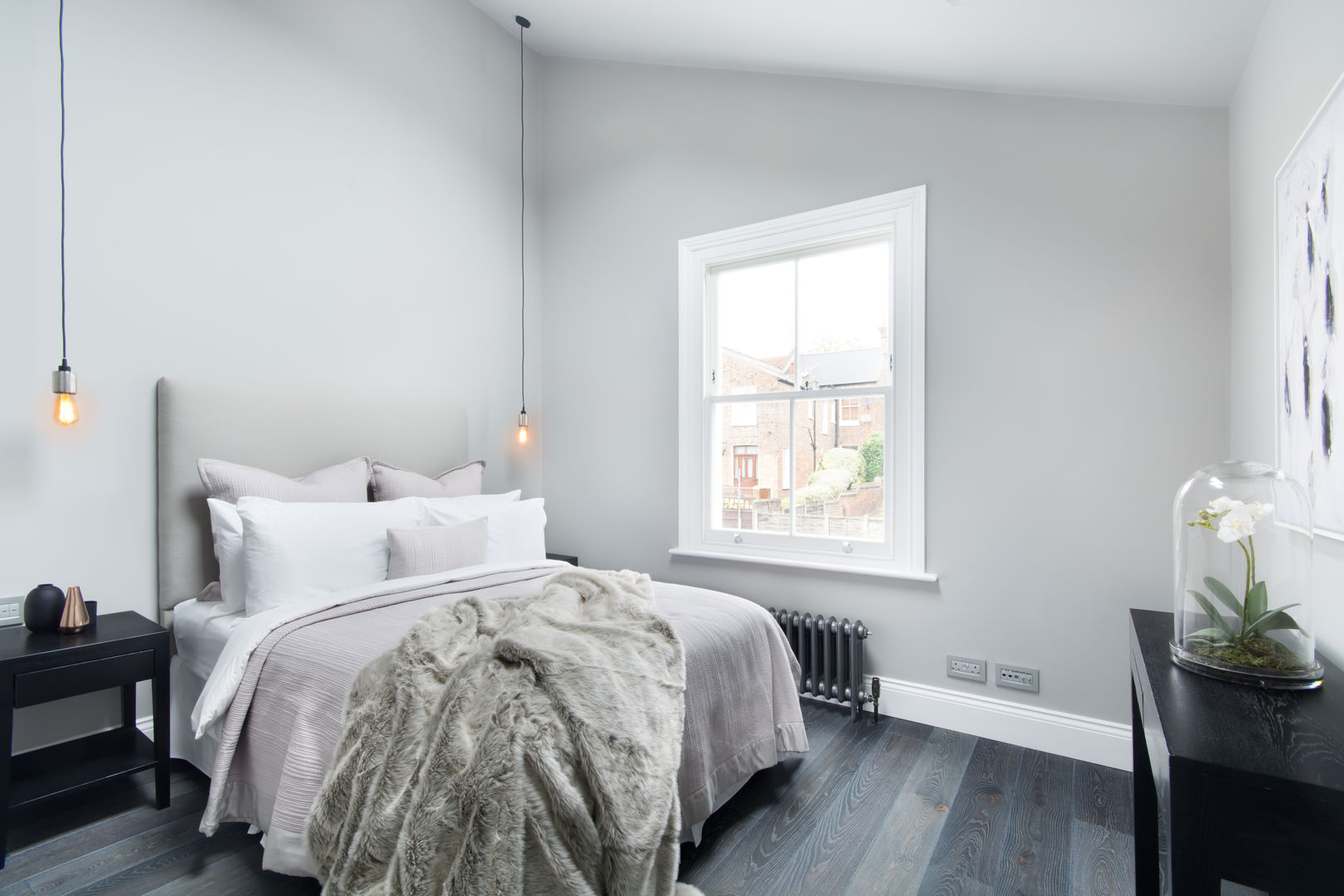 Vaulted Bedroom London Home Staging Ltd Modern Bedroom modern,minimal,faux fur,wood flooring,grey,radiator,lightbulb