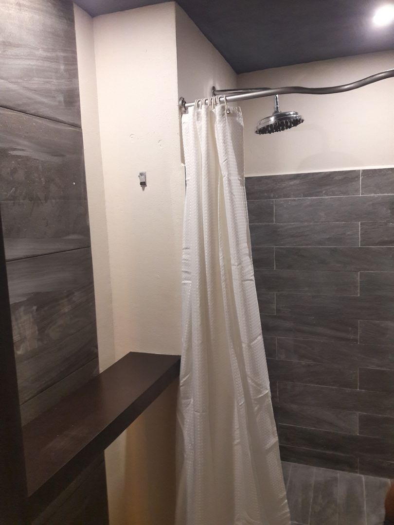 baño de hotel homify Baños de estilo ecléctico