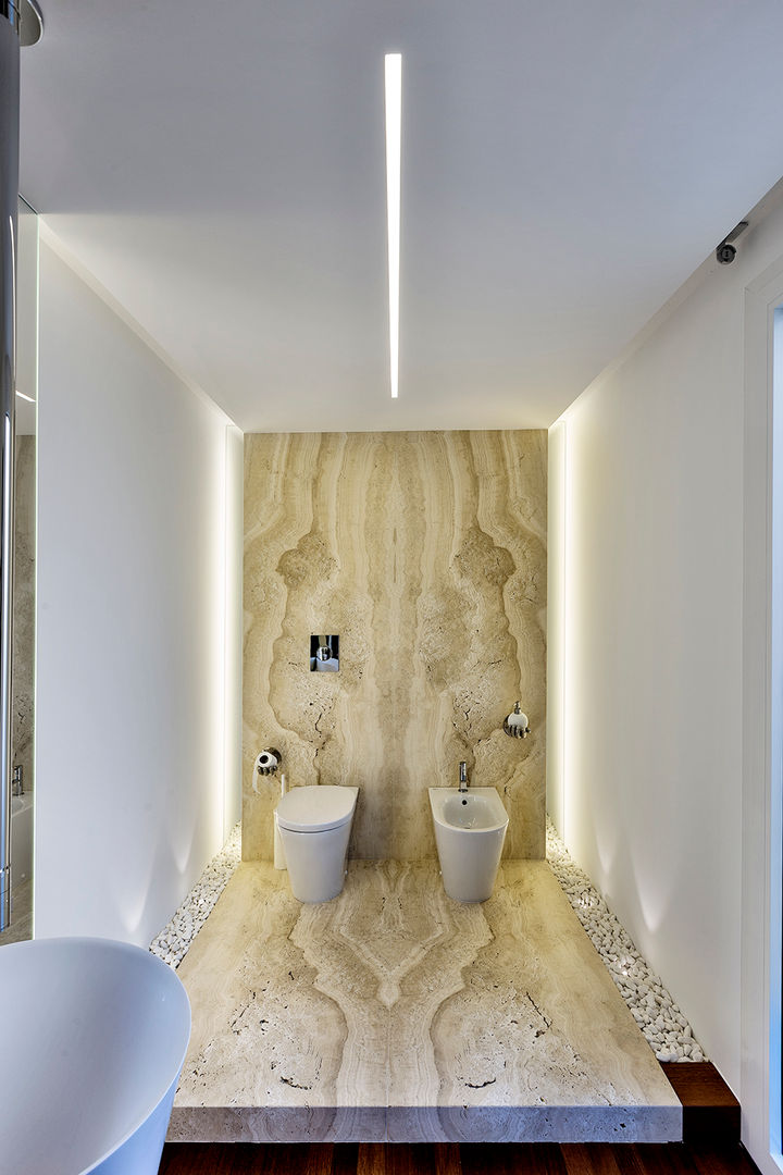 Ristrutturazione casa a schiera, Arch. Antonella Laruccia Arch. Antonella Laruccia Minimalist style bathrooms Stone