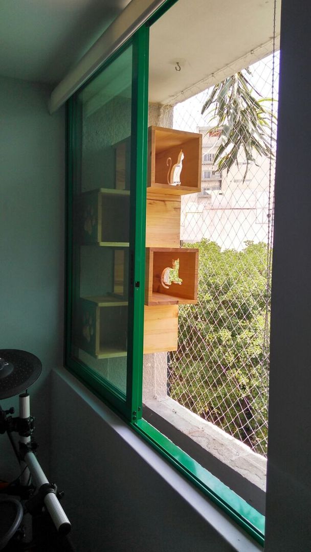 Espacio para gatos con proteccion VIVE arquitectura Balcones y terrazas modernos