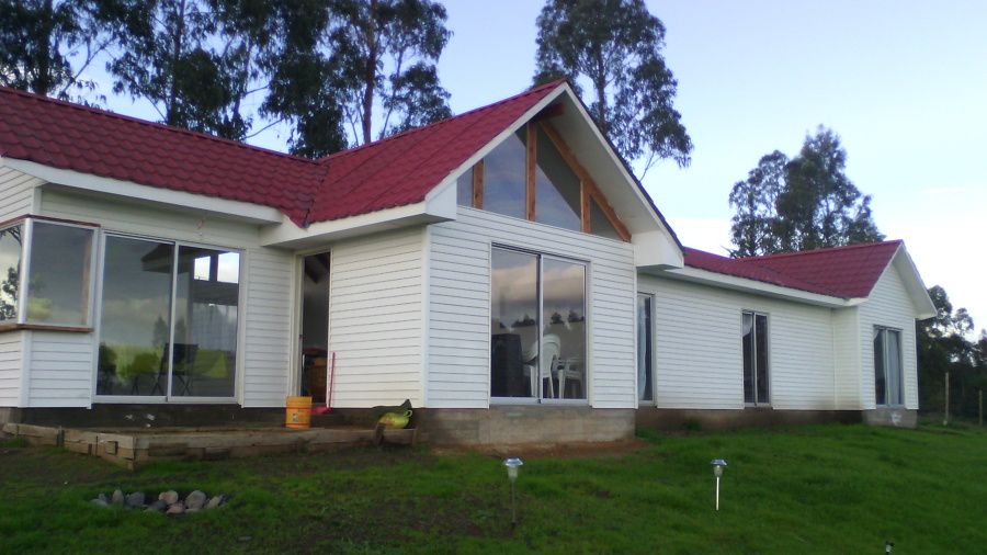 homify Wooden houses Wood-Plastic Composite