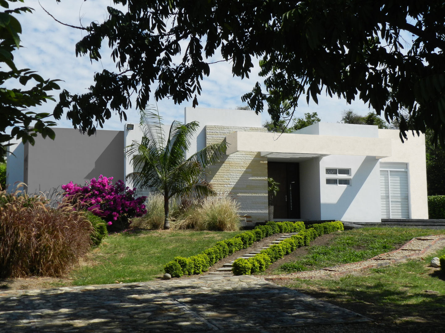 Otras casas de clima calido., Arquitectos y Entorno S.A.S Arquitectos y Entorno S.A.S Modern houses