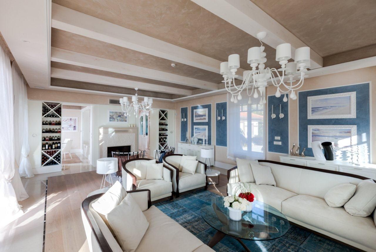 Villa Olivia, una residenza di lusso con vista mozzafiato sull’Egeo e spiaggia privata, Studio D73 Studio D73 Вітальня