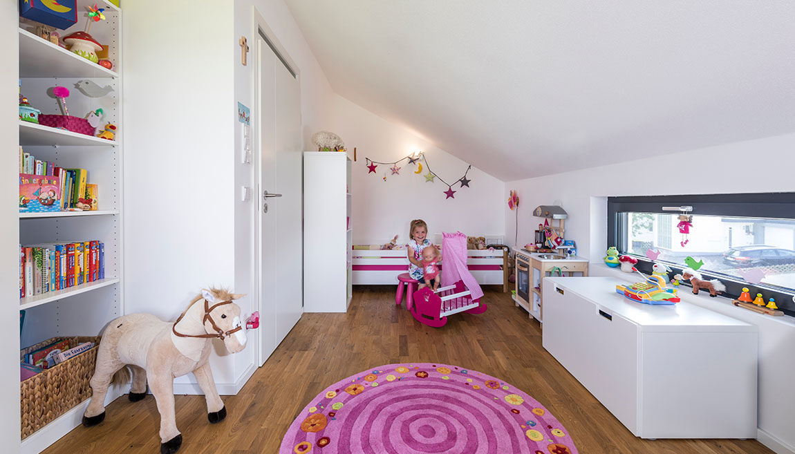 Überzeugend geplant – komfortabel gebaut, KitzlingerHaus GmbH & Co. KG KitzlingerHaus GmbH & Co. KG Girls Bedroom