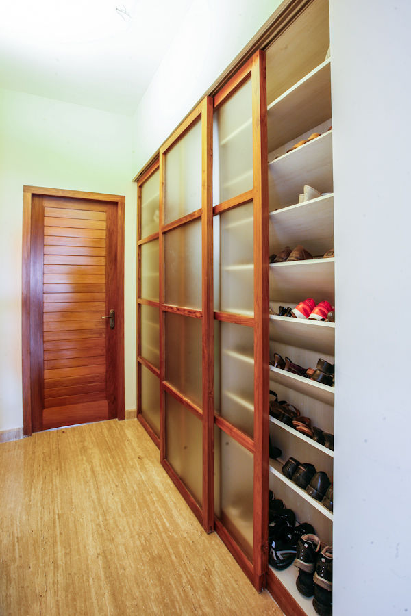 Walk-in Footwear Closet The Workroom Modern corridor, hallway & stairs