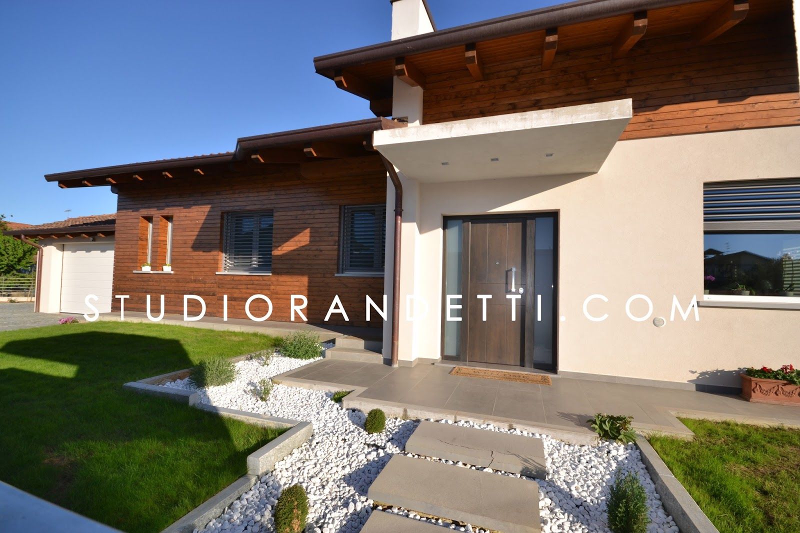 Villa Moderna e di Design by Studio Randetti, STUDIO RANDETTI - PROGETTAZIONE E DESIGN STUDIO RANDETTI - PROGETTAZIONE E DESIGN Modern Houses Wood Wood effect