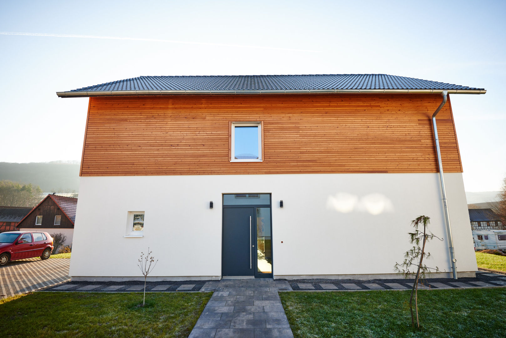 Haus am See, PassivHausPartschefeld PassivHausPartschefeld Passive house Solid Wood Multicolored