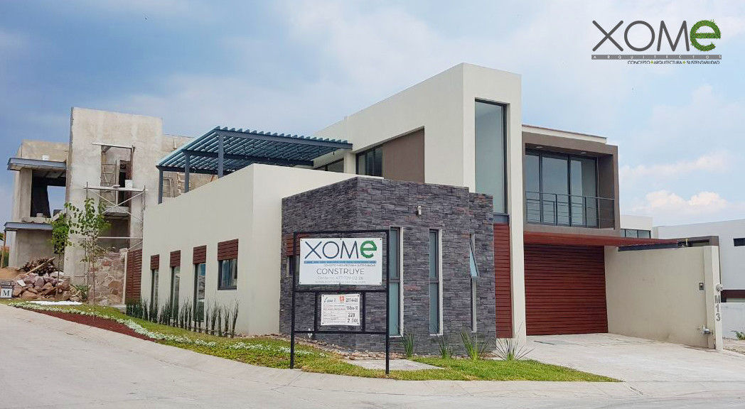 M-13, Xome Arquitectos Xome Arquitectos บ้านและที่อยู่อาศัย หิน