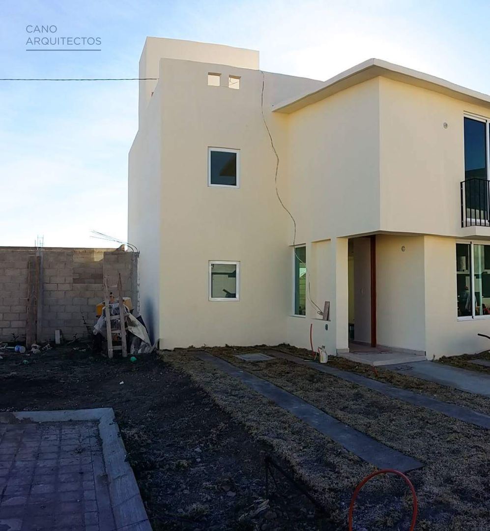 Casa 33 CANO ARQUITECTOS Casas de estilo rústico