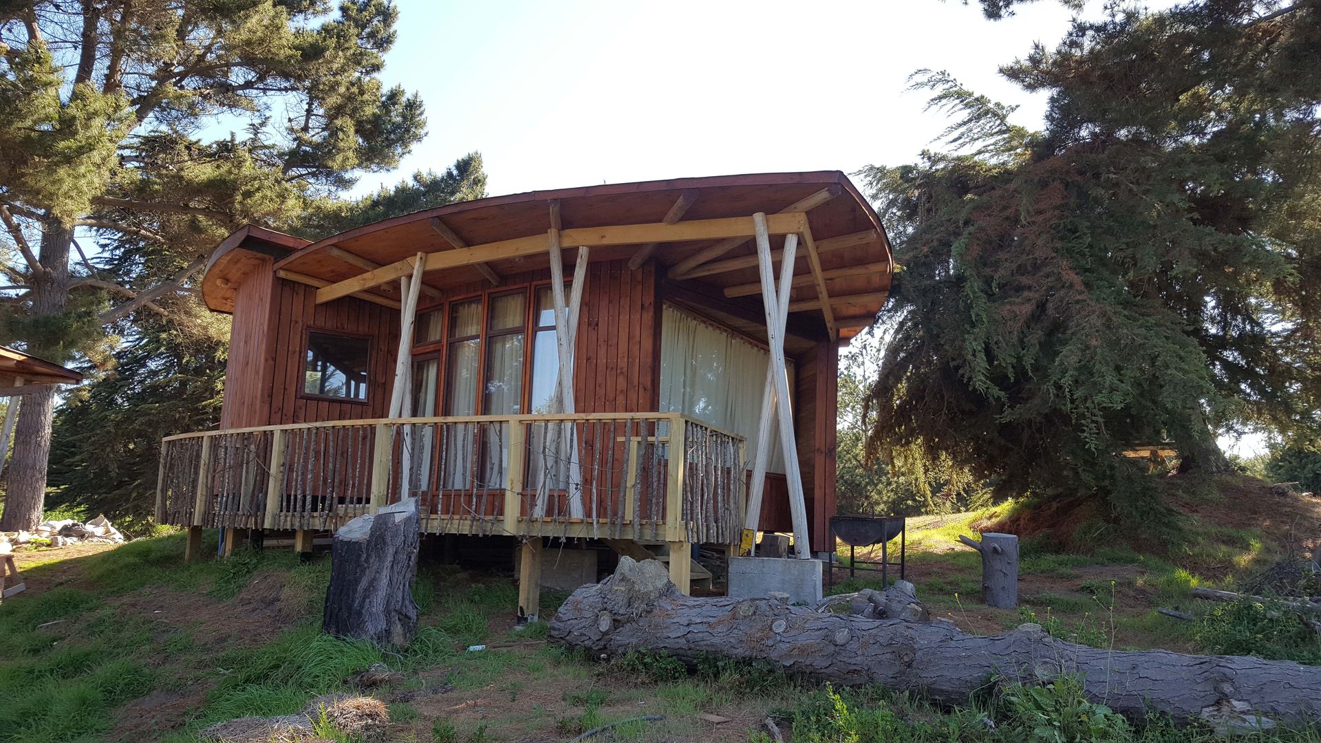 KIMCHE LODGE, CAMINO A CAHUIL, PICHILEMU, KIMCHE ARQUITECTOS KIMCHE ARQUITECTOS Bungalows Madera Acabado en madera