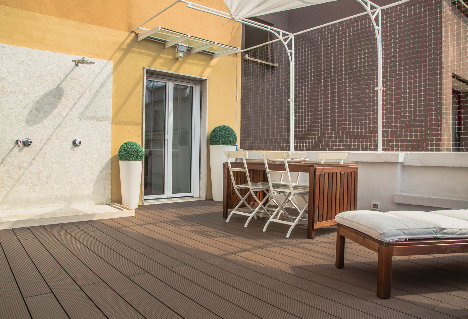 Terrazzo DELFINETTIDESIGN Balcone, Veranda & Terrazza in stile moderno