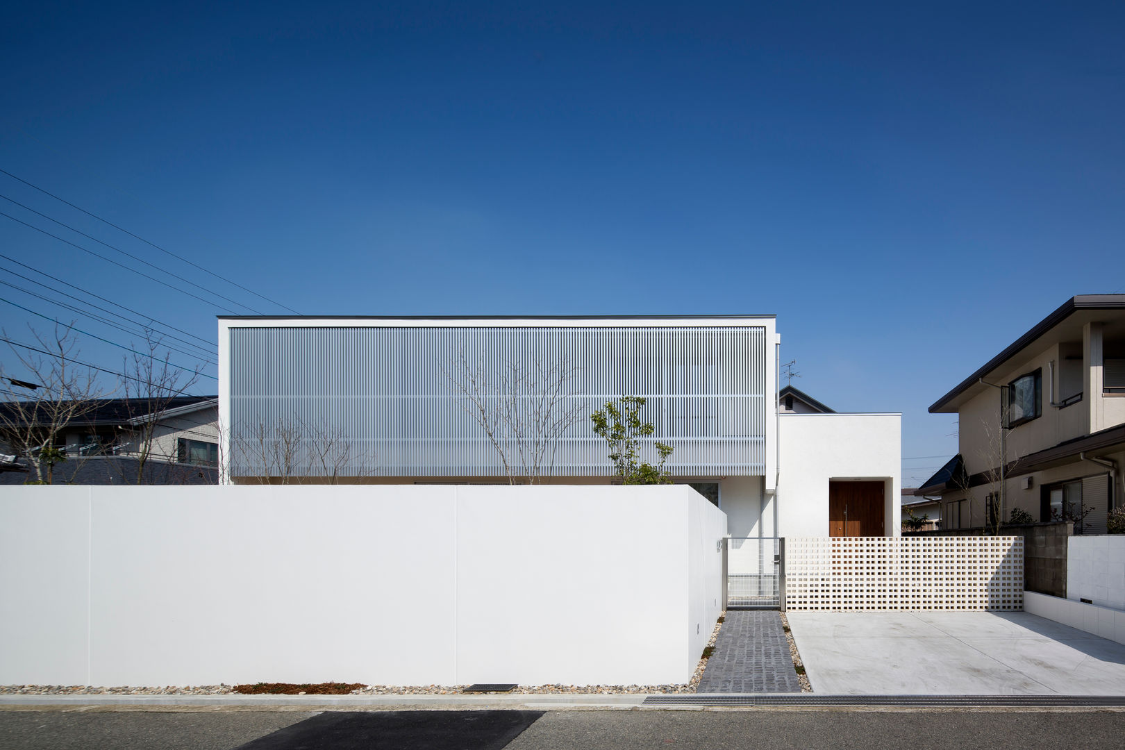 松原の家, 吉川弥志設計工房 吉川弥志設計工房 Casas unifamilares Aluminio/Cinc