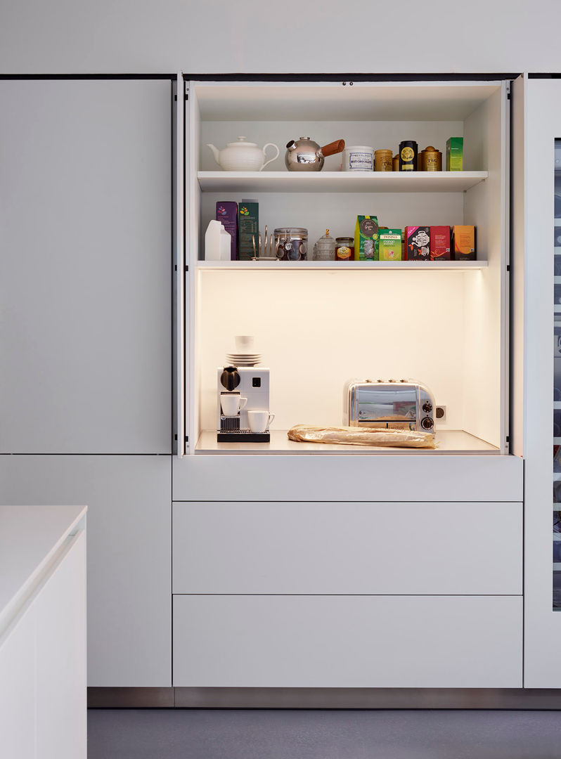 Modern Monochrome Kitchen Architecture Cocinas modernas kitchen architecture,bulthaup,bulthaup b3,bespoke kitchen,contemporary kitchen,white kitchen,pocket door,hidden storage,kitchen storage