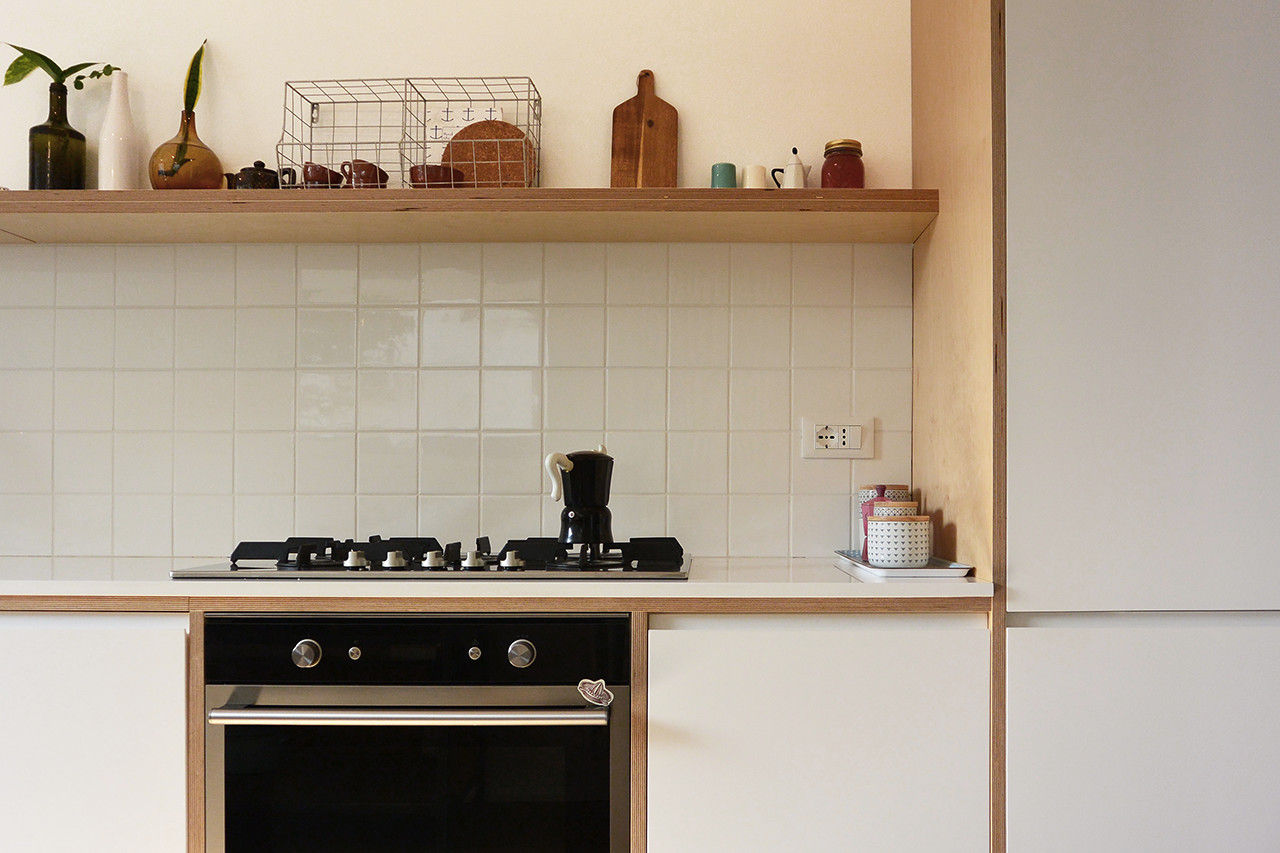 Casa unifamiliare DN, studiovert studiovert Built-in kitchens Wood Wood effect