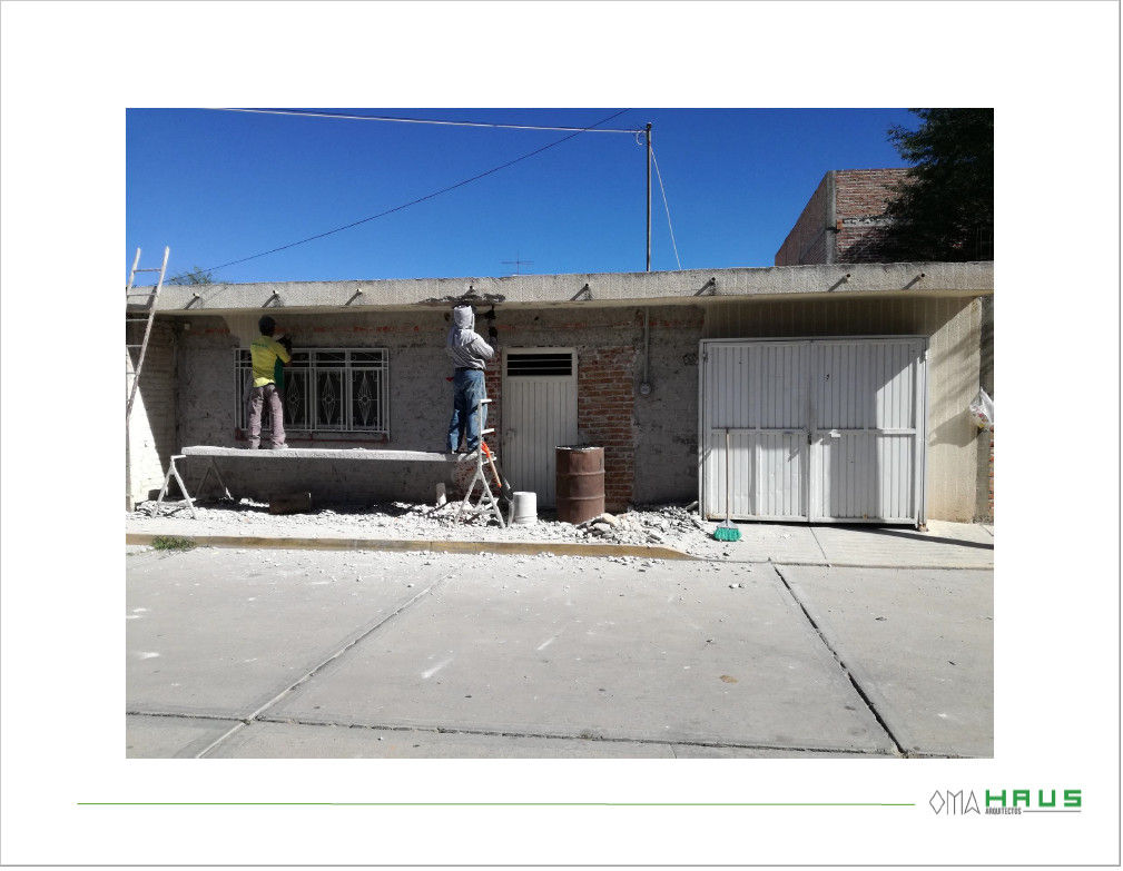 Remodelación de fachada de casa habitación, OmaHaus Arquitectos OmaHaus Arquitectos บ้านและที่อยู่อาศัย