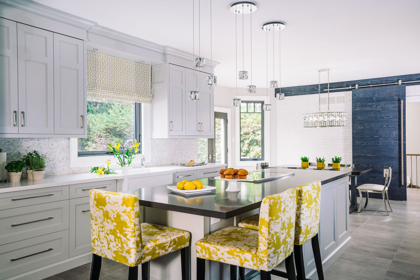 Bright and Cheery Kitchen Frahm Interiors Modern kitchen yellow,barstools,island,quartz,crystal pendants,grey,black