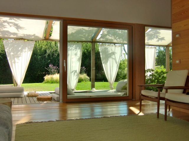 Casa in legno nella campagna veneta, Woodbau Srl Woodbau Srl Wooden windows Wood Wood effect