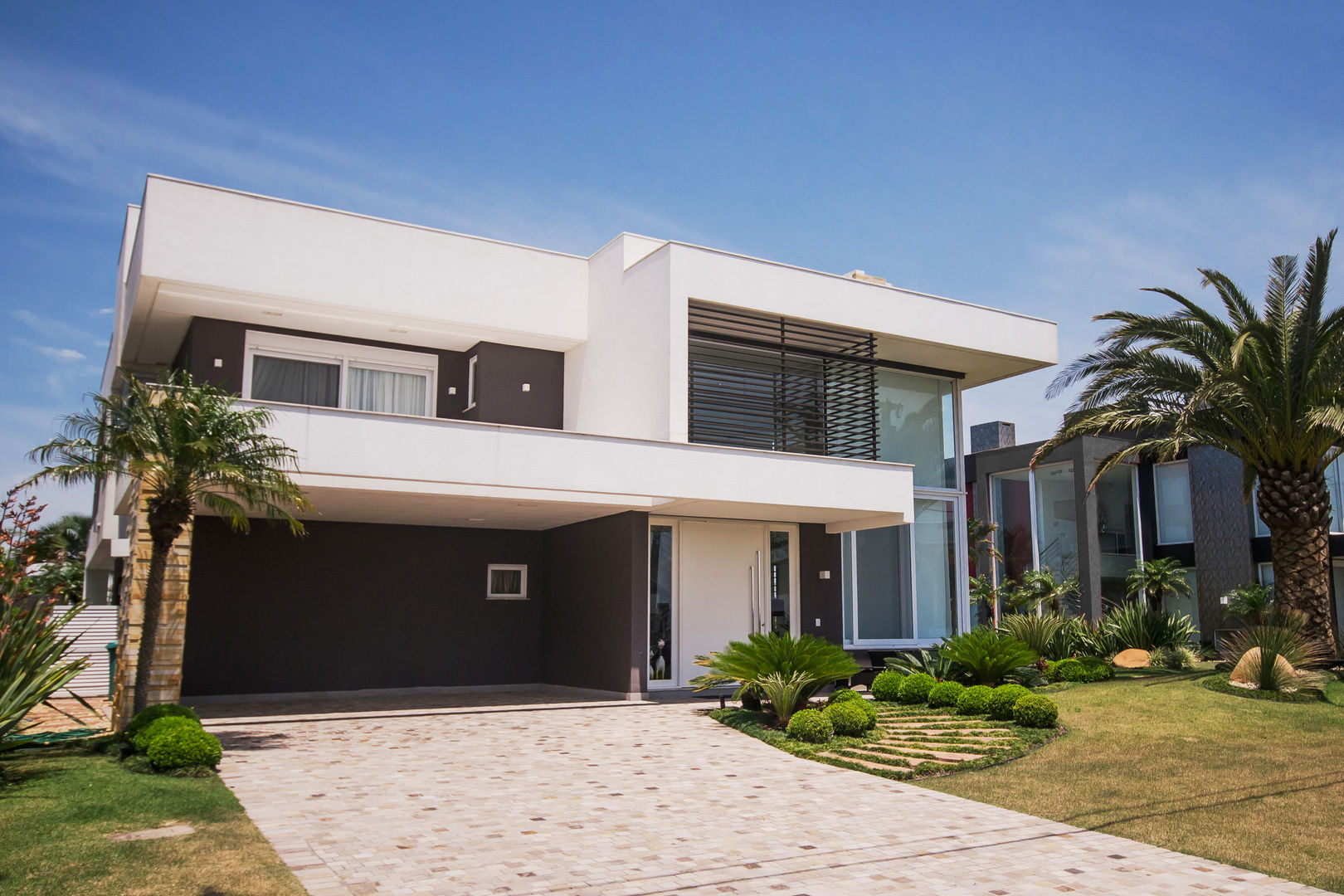 Residência C135, Arquiteto Vinicius Vargas Arquiteto Vinicius Vargas Nhà gia đình Cục đá