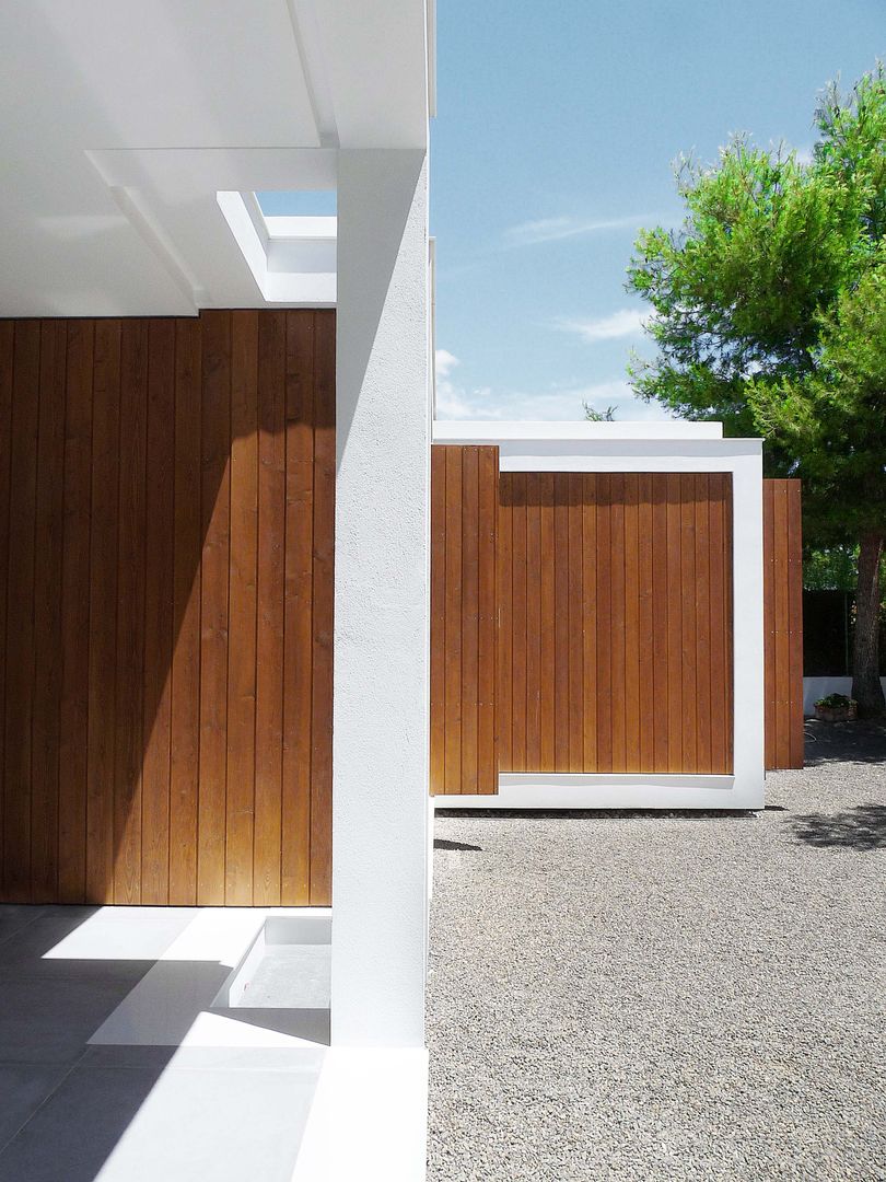 MAISON ELIANA, CALMM ARCHITECTURE CALMM ARCHITECTURE Maisons minimalistes Bois Effet bois