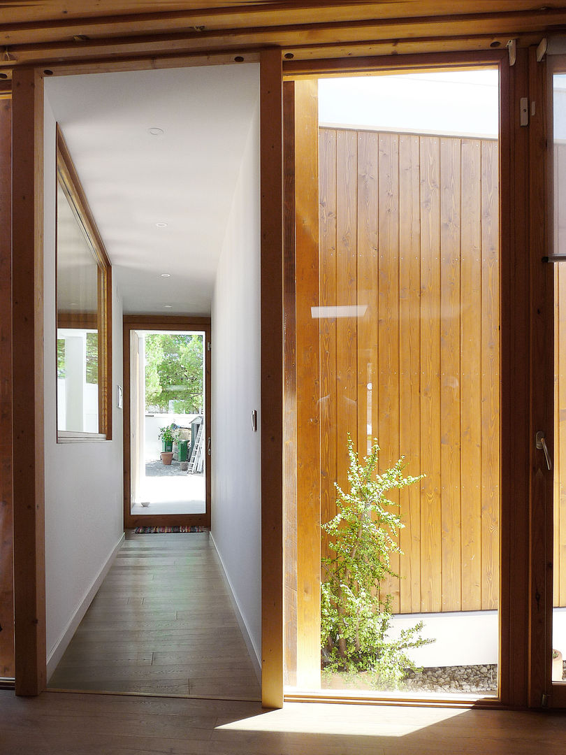 MAISON ELIANA, CALMM ARCHITECTURE CALMM ARCHITECTURE Maisons minimalistes Bois Effet bois