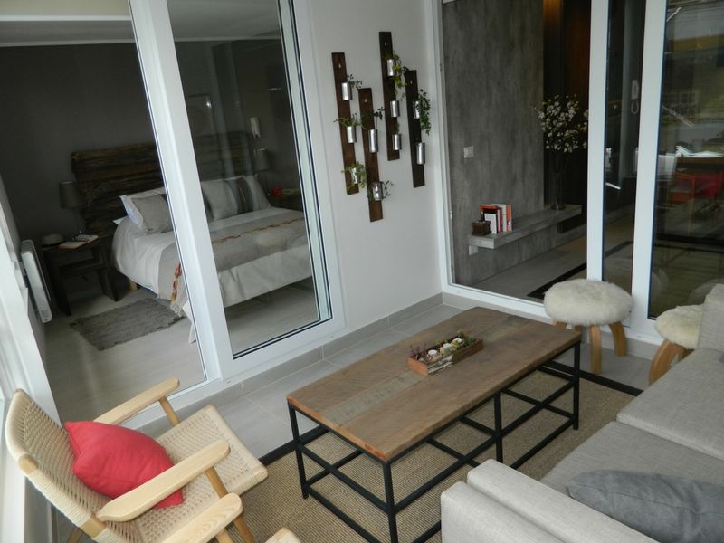 Departamento piloto Puerto Varas, DDO Diseño DDO Diseño Rustic style balcony, veranda & terrace Wood Wood effect