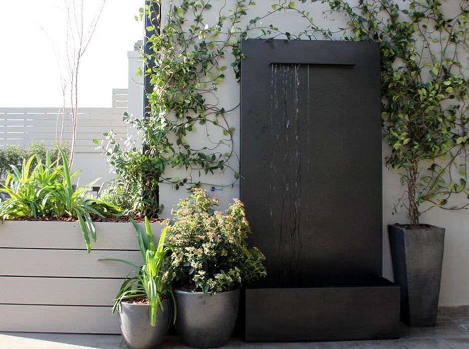 Terraza de vivienda - Fuente, La Habitación Verde La Habitación Verde Giardino moderno