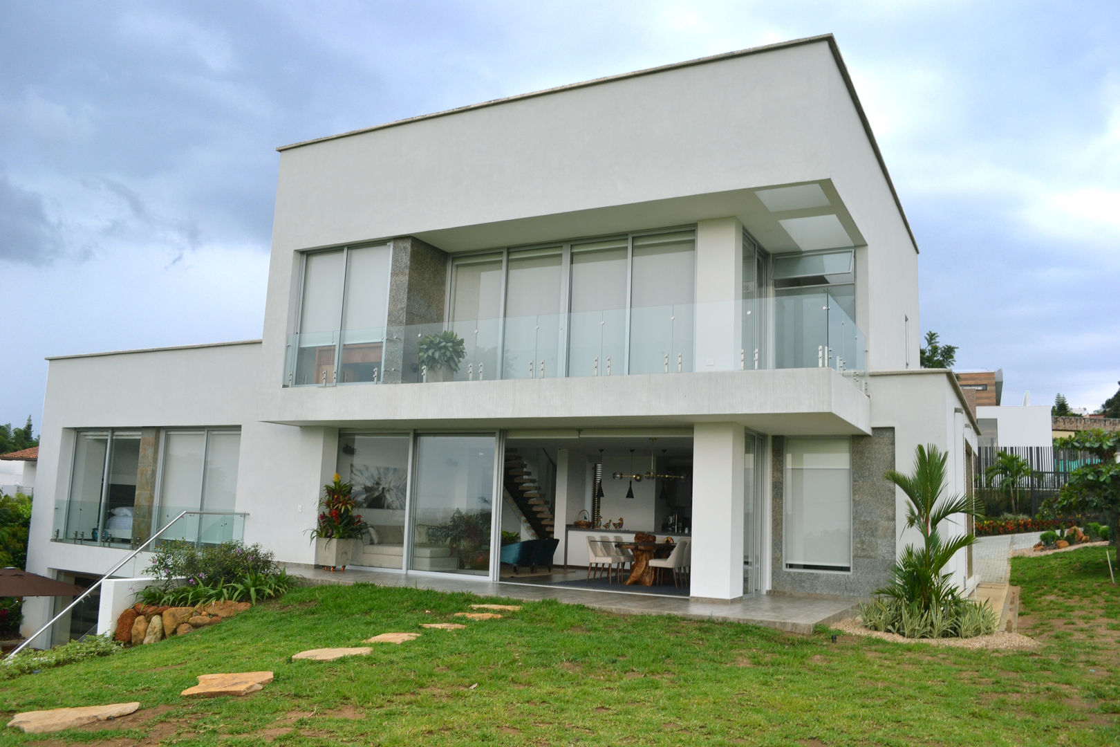 Casa Gaviria, Visual Arquitectos Visual Arquitectos Wooden houses