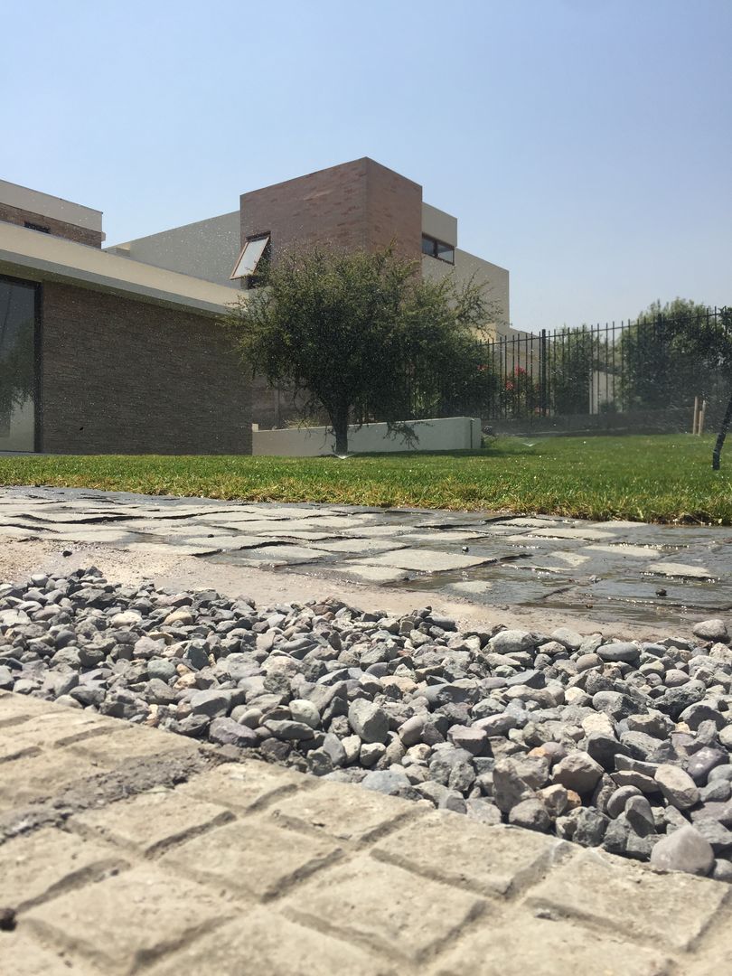 Casa Los ríos , Piedra Roja proyecto arquitek Casas unifamiliares Aglomerado