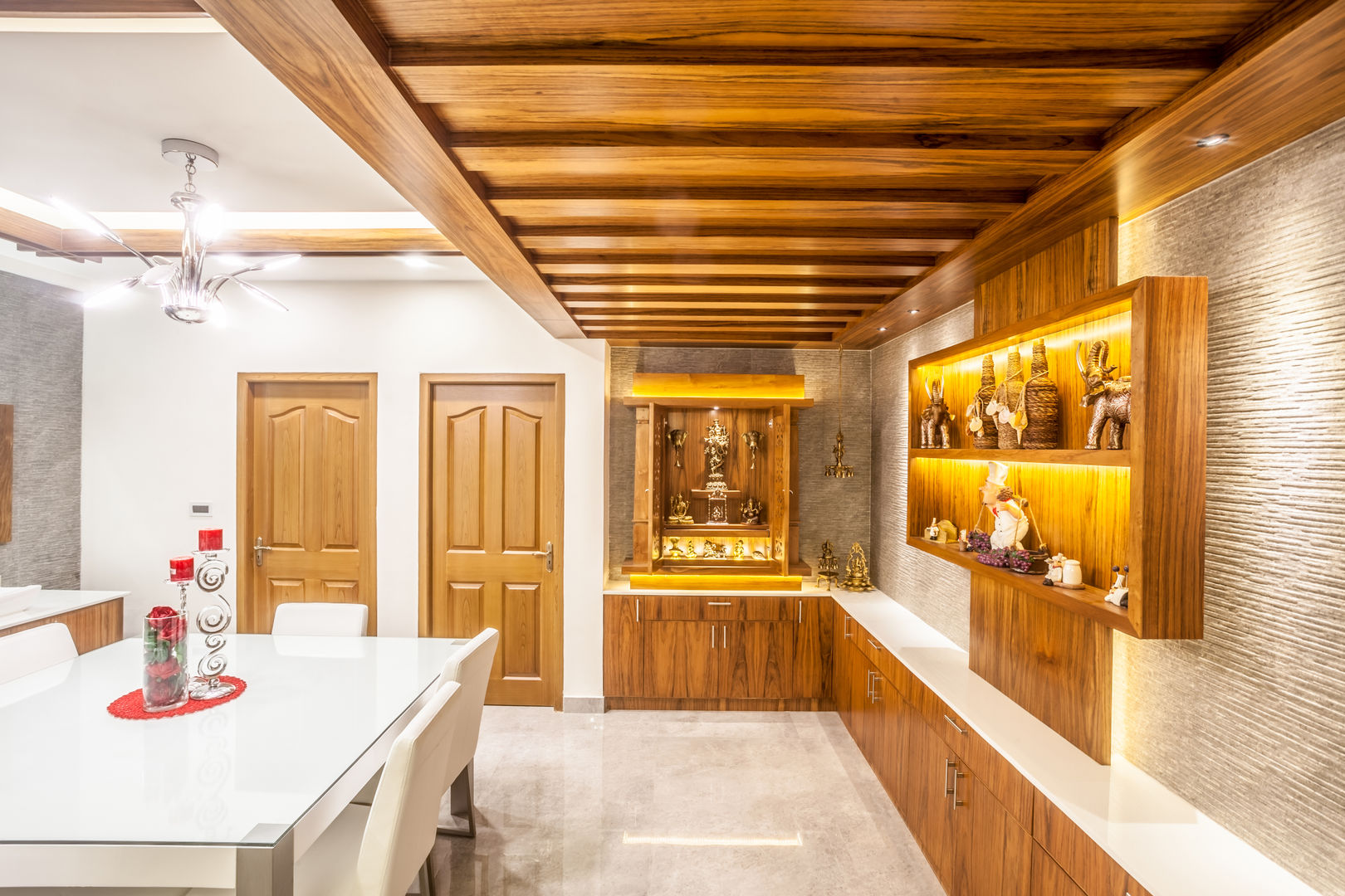 The mural apartment, S Squared Architects Pvt Ltd. S Squared Architects Pvt Ltd. Asian style dining room Engineered Wood Transparent Dining room,Pooja cabinet,LED strip lighting