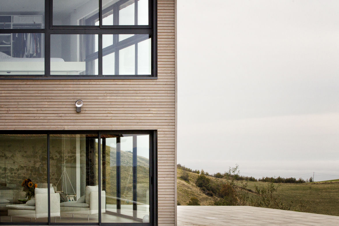 Rénovation d'une grange avec extension, Optiréno Optiréno Landhaus Holz Holznachbildung